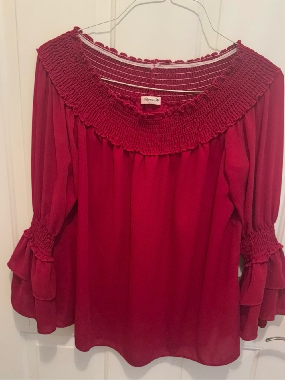 Smocked Off-Shoulder Blouse in Burgundy by Charming Charlie
